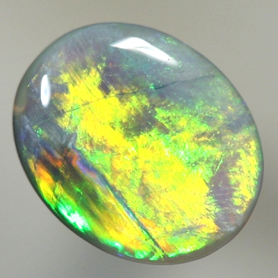 SOLID SEMI BLACK OPAL Neon orange turns to neon green in a broad rolling flash